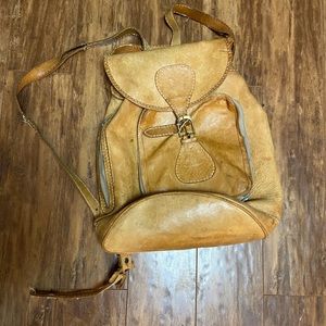 SOLD do not buy. Thrashed vintage leather backpack